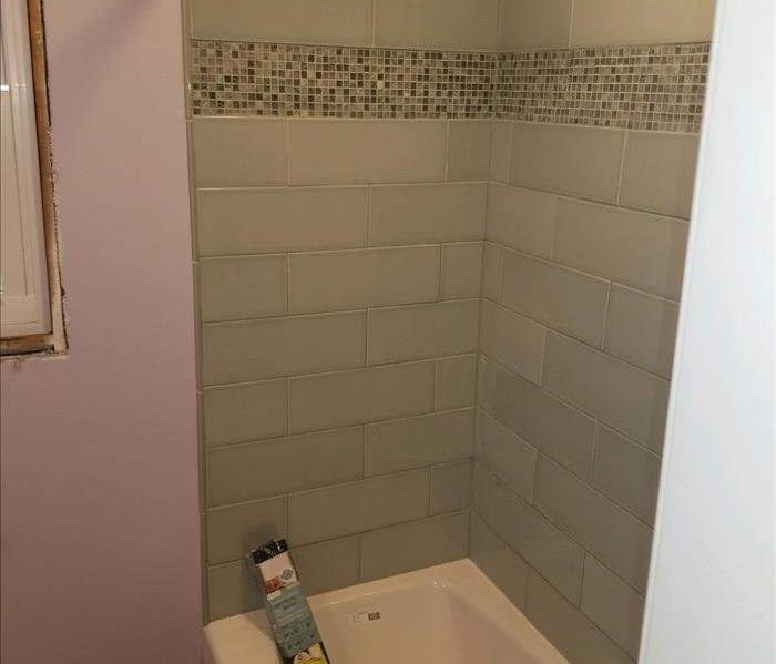 Photo of remodeled bathroom after fire and soot damage