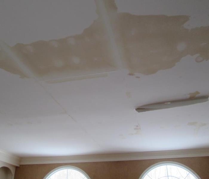 Photo of water damaged ceiling