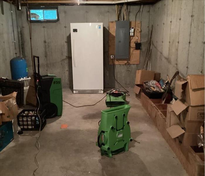 The same basement after drying and restoration services.