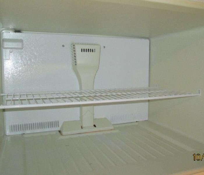 Photo of refrigerator after being cleaned