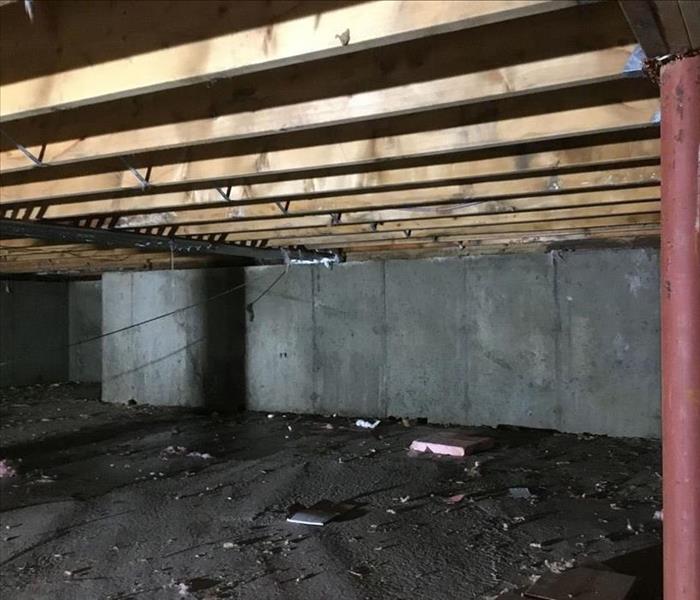 Clean crawlspace without debris or hanging insulation