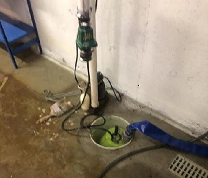 Photo of Sump Pump in a basement