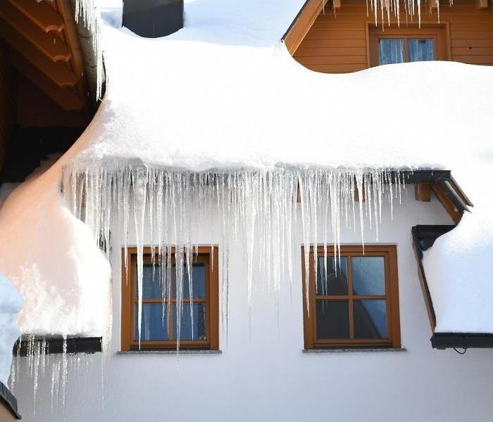 House with icicles hanging off roof