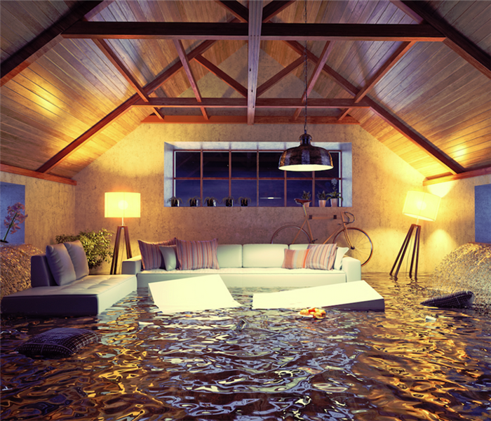 a flooded living room with furniture floating everywhere